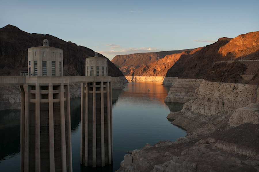 A bathtub ring of light minerals shows the high water line of Lake Mead near water intakes on the Arizona side of Hoover Dam at the Lake Mead National Recreation Area Sunday, June 26, 2022, near Boulder City, Nev. The reservoir is now below 30 percent of capacity, Its level has dropped 170 feet (52 meters) since reaching a high-water mark in 1983.